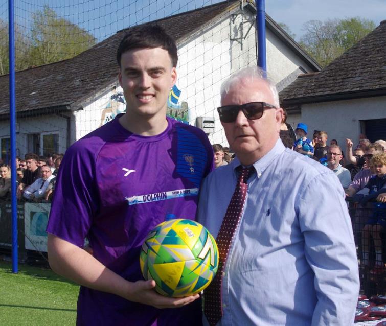 Man of the Match - Nick Jones with Manderwood representative Daisy Picton